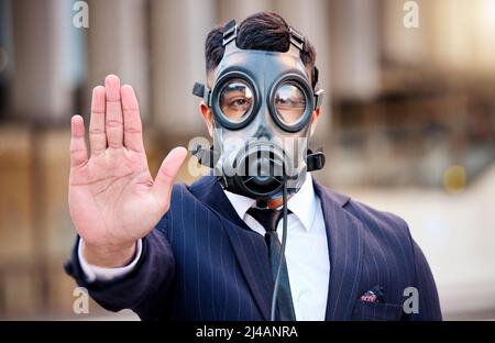 Stop the destruction of the earth. Shot of a young businessman on a construction site using a digital tablet. Stock Photo