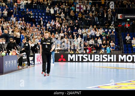 Kiel, Germany. 13th Apr, 2022. Handball: World Cup qualifying, Germany - Faroe Islands, Europe, knockout round, 3rd qualifying round, first leg, Wunderino Arena. Germany's coach Alfred Gislason leaves the pitch. Credit: Frank Molter/dpa/Alamy Live News Stock Photo