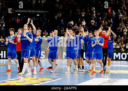 Kiel, Germany. 13th Apr, 2022. Handball: World Cup qualifier, Germany - Faroe Islands, Europe, knockout round, 3rd qualifying round, first leg, Wunderino Arena. The Faroe Islands players clap after the match. Credit: Frank Molter/dpa/Alamy Live News Stock Photo