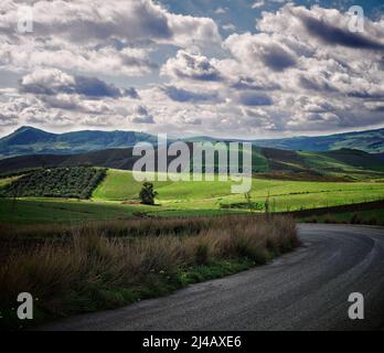 dramatic landscape with storm clouds on countryside in Sicily, Italy Stock Photo