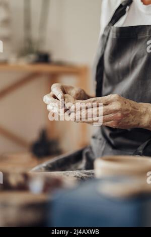 Close Up of Handmade Process, Female Pottery Master Creating Product from a Clay in Her Studio Stock Photo