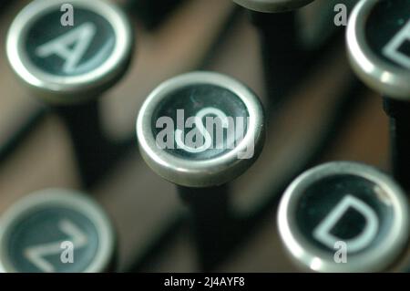 An Old manual typewriter with its working keyes with numbers and lettersl Stock Photo