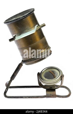 vintage pocket microscope isolated on white background Stock Photo