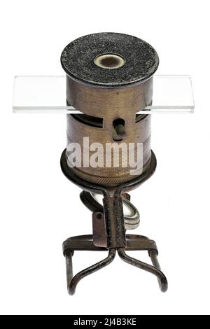 vintage pocket microscope isolated on white background Stock Photo