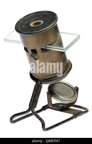 vintage pocket microscope isolated on white background Stock Photo