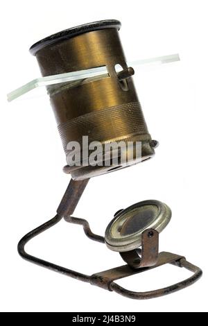 vintage pocket microscope isolated on white background Stock Photo