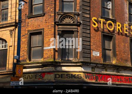 Manchester, England - United States - March 23rd, 2022: Old storefront in  Manchester on a sunny Spring day. Stock Photo