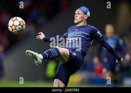 Madrid, Spain. 13th Apr, 2022. Phil Foden of Manchester City during the UEFA Champions League match, Quarter Final, Second Leg, between Atletico de Madrid and Manchester City played at Wanda Metropolitano Stadium on April 13, 2022 in Madrid, Spain. (Photo by Ruben Albarran/PRESSINPHOTO) Credit: PRESSINPHOTO SPORTS AGENCY/Alamy Live News Stock Photo