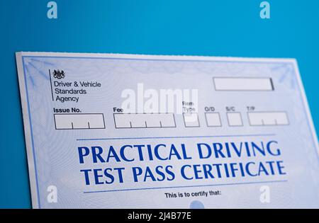 Authentic Practical Driving Test Certificate which is received after passing driving test in the UK. Stafford, United Kingdom, April 13, 2022. Stock Photo