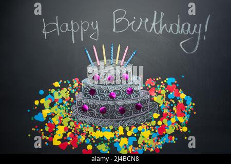 Birthday cake and Happy Birthday ornaments Stock Photo - Alamy