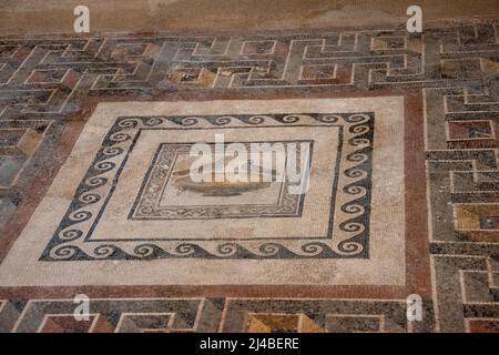 The tiled mosaic floor of the Central Courtyard of the Domvs Romana (Roman Villa) in Rabat, Malta. Stock Photo