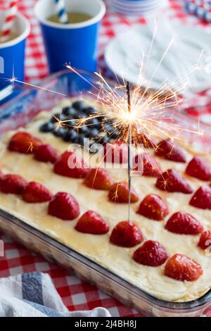 A cheesecake tart with American flag design for 4th of July celebration. Stock Photo