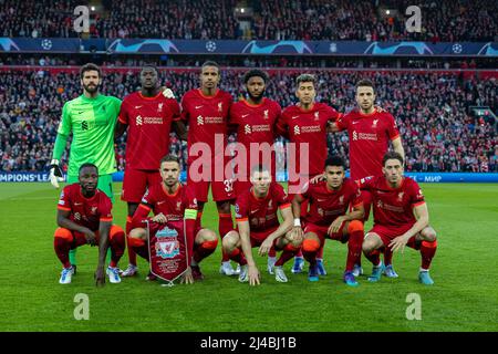 Liverpool. 14th Apr, 2022. Liverpool players line up for a team group photo before the UEFA Champions League Quarterfinal 2nd Leg match between Liverpool and Benfica in Liverpool, Britain, on April 13, 2022. The game ended in a 3-3 draw. Liverpool won 6-4 on aggregate. Credit: Xinhua/Alamy Live News Stock Photo