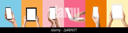 Set of hands holding gadgets and devices with blank screens on colorful background. Mockup for design Stock Photo