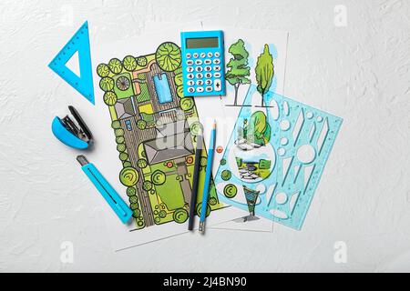 Paper sheets with sketches for landscape design and stationery on white background Stock Photo