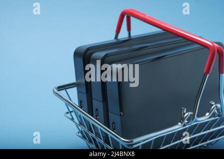 A stack of hard drives in a basket. Stock Photo