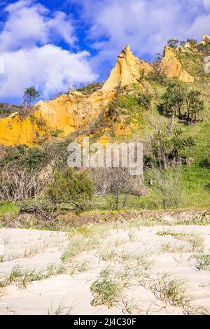 The Pinnacles are colourful sand dunes on the eastern coastline, along Seventy Five Mile Beach on Fraser Island, Queensland, Australia Stock Photo