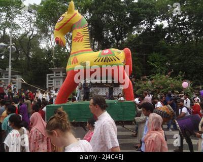 Dhaka, Bangladesh. 14th Apr, 2022. People participate in the Mangal Shovajatra festival rally to celebrate the Bangla New year at the Dhaka University. (Credit Image: © MD Mehedi Hasan/ZUMA Press Wire) Credit: ZUMA Press, Inc./Alamy Live News Stock Photo