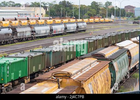Coal and other mining ore product rail cars or wagons lined up at Port Waratah Coal Services Terminal at Carrington New South Wales, Australia Stock Photo