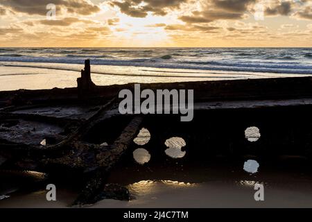 Maheno shipwreck at sunrise on Seventy Five Mile Beach on Fraser Island, Queensland, Australia Stock Photo