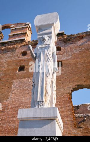 The large, marble sculpture of an Egyptian Goddess, with lion head. At the Red Basilica, Church in old Pergamon, now Bergama city, Turkey Stock Photo