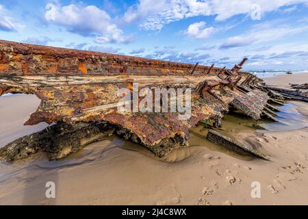A broken off section of the Maheno shipwreck on the Eastern Beach on Fraser Island, Queensland, Australia Stock Photo