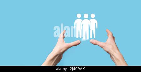 Businessman hold teamwork icon. Building a strong team. people icon ...