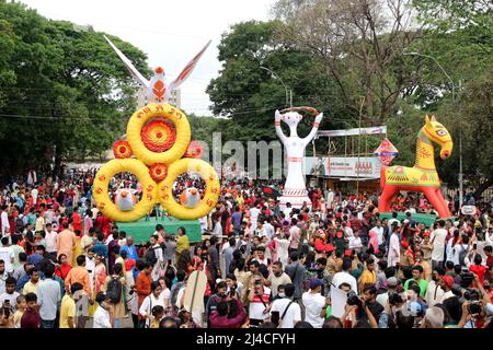 Dhaka, Bangladesh. 14th Apr, 2022. People march along a street to celebrate the Bengali New Year or 'Pohela Boishakh' colourful procession observed on the first day of the Bangla New Year, in a very festive mood this year as part of Pohela Boishakh celebrations in Dhaka, Bangladesh on April 14, 2022. Photo by Habibur Rahman/ABACAPRESS.COM Credit: Abaca Press/Alamy Live News Stock Photo