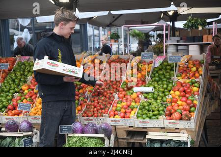 Copenhagen/Denmark/.14 April 2022/.Out door  fruit and vegetables hopper find higher food prices in Denmark and at fruit and vegetable vendor in danish capital. (Photo..Francis Dean/Dean Pictures) Stock Photo