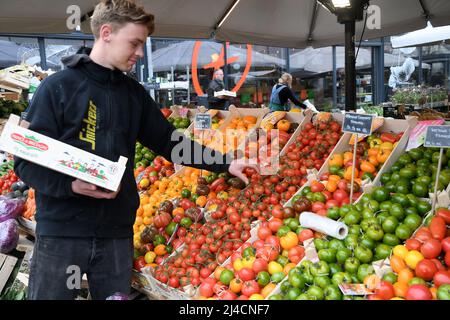 Copenhagen/Denmark/.14 April 2022/.Out door  fruit and vegetables hopper find higher food prices in Denmark and at fruit and vegetable vendor in danish capital. (Photo..Francis Dean/Dean Pictures) Stock Photo