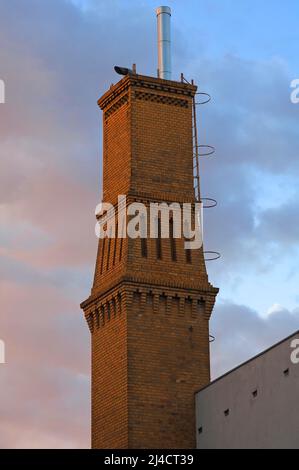 Old brick factory chimney in the evening light, Goerlitz, Upper Lusatia, Saxony, Germany Stock Photo