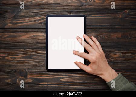 young man using a Tablet pc . close-up. Stock Photo
