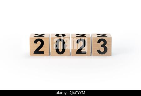 Wooden Blocks With 2022 2023 Number isolated on white background. Start new year 2023 with goal plan, goal concept, action plan, strategy, new year bu Stock Photo