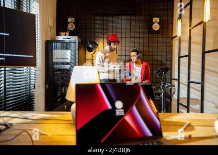 Men playing electric drums at home sstudio Stock Photo