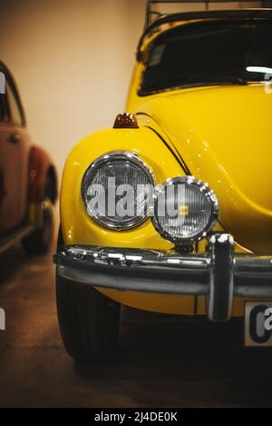 Izmir, Turkey - December 4, 2021: Close up shot of Volkswagen Beetle classic cars headlight lamp at the exhibition of classic cars Izmir fair. Stock Photo