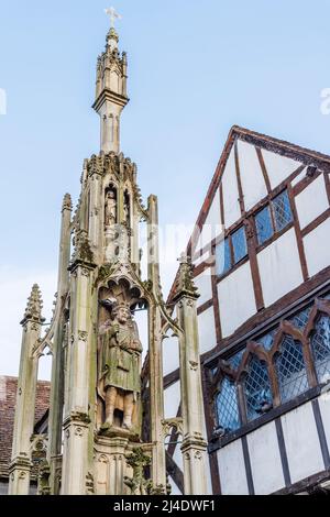 The Buttercross, a historic holy cross monument and landmark, High Street, town centre of Winchester with statue of King Alfred, Hampshire, England Stock Photo