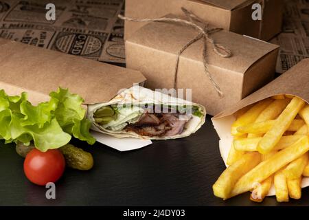 roll with pita bread and seafood on a white background Stock Photo