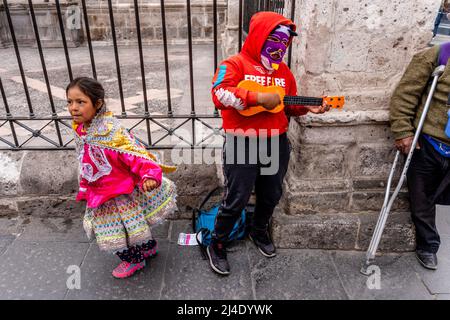 Children Busking On The Streets Of Arequipa,  Arequipa Region, Peru. Stock Photo