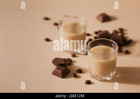 Short glasses of Irish cream Liquor or Coffee Liqueur with chocolate Stock Photo