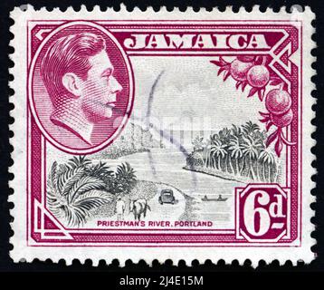 JAMAICA - CIRCA 1938: a stamp printed in Jamaica shows Priestman's River, Portland Parish, circa 1938 Stock Photo