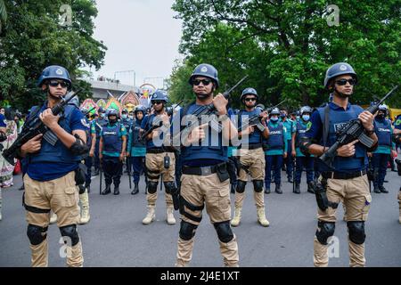 Members of the Special Security Force are deployed during the celebration of the first day of the Bengali New Year. Bangladeshi people participate in a colorful parade to celebrate the first day of the Bengali New Year or Pohela Boishakh on April 14. Thousands of Bangladeshi people celebrate it with different colorful rallies, cultural programs with traditional dance and music, this Bengali year was introduced during the regime of Emperor Akbar to facilitate revenue collection in the 16th century. (Photo by Piyas Biswas/SOPA Images/Sipa USA) Stock Photo