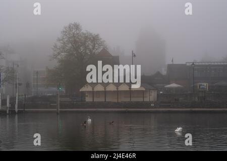 Windsor, Berkshire, UK. 14th April, 2022. The Curfew Tower at Windsor Castle surrounded by mist this morning. The Easter Bank Holiday weekend is expected to be warm and sunny. Credit: Maureen McLean/Alamy Live News Stock Photo