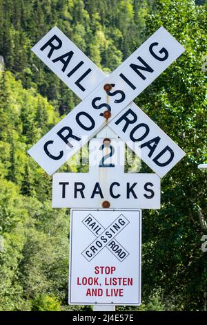 American Railroad Railway Crossing Sign Level Crossing Without Gates In Skagway Alaska Stock Photo