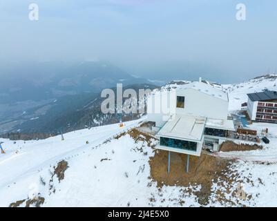 Lumen museum and restaurant on snow covered mountain against sky in alps Stock Photo
