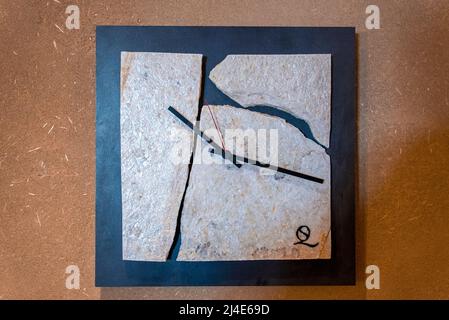 Close-up of rustic style simple unique clock on brown wall at luxurious hotel Stock Photo