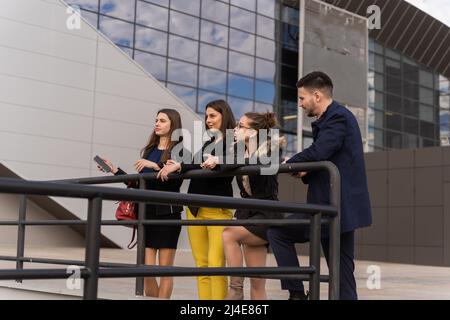 Group of young business people are looking at the distance Stock Photo