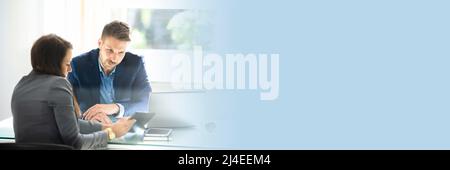 Professional Businessman And Businesswoman Discussing The Project In The Meeting At Office Stock Photo