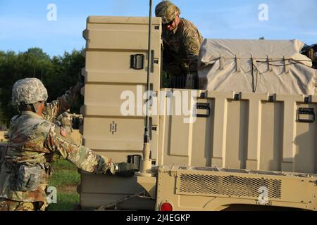 Counter Mortar Radar  - New York Army National Guard Soldiers with the 27th Infantry Brigade Combat Team set up a  AN/TPQ-50 Lightweight Counter Mortar Radar (LCMR) on July 31, 2019, at Fort Drum, New York. The radar section for the 27th Infantry Brigade Combat Team took a course on the new radar system that was over a week long before testing in the field.( U.S. Army National Guard photo by Sgt. Andrew Winchell )Counter rocket, artillery, and mortar, abbreviated C-RAM or counter-RAM, is a set of systems used to detect and/or destroy incoming rockets, artillery, and mortar rounds in the air. Stock Photo