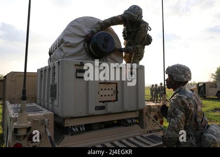 Counter Mortar Radar  - New York Army National Guard Soldiers with the 27th Infantry Brigade Combat Team set up a  AN/TPQ-50 Lightweight Counter Mortar Radar (LCMR) on July 31, 2019, at Fort Drum, New York. The radar section for the 27th Infantry Brigade Combat Team took a course on the new radar system that was over a week long before testing in the field.( U.S. Army National Guard photo by Sgt. Andrew Winchell ) Counter rocket, artillery, and mortar, abbreviated C-RAM or counter-RAM, is a set of systems used to detect and/or destroy incoming rockets, artillery, and mortar rounds in the air. Stock Photo