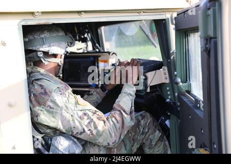 Counter Mortar Radar  - A New York Army National Guard Soldier with the 27th Infantry Brigade Combat Team trains with the AN/TPQ-50 Lightweight Counter Mortar Radar (LCMR) on July 31, 2019, at Fort Drum, New York. The radar section for the 27th Infantry Brigade Combat Team took a course on the new radar system that was over a week long before testing in the field.( U.S. Army National Guard photo by Sgt. Andrew Winchell ) Counter rocket, artillery, and mortar, abbreviated C-RAM or counter-RAM, is a set of systems used to detect and/or destroy incoming rockets, artillery, and mortar rounds. Stock Photo